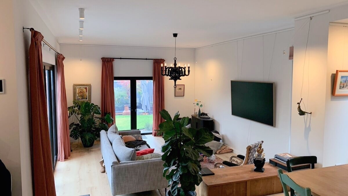 Mt Hawthorn Passiv Haus living area with glass doors opening to garden